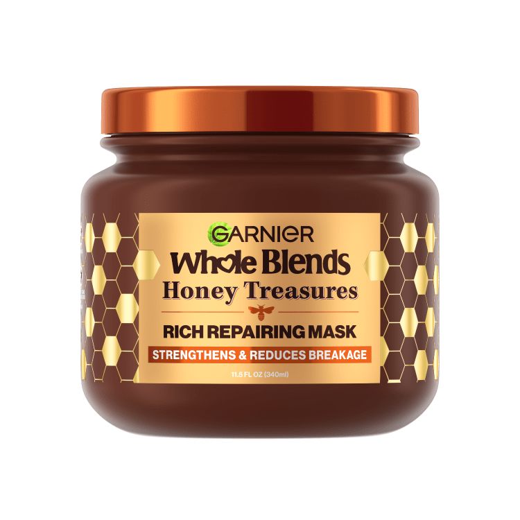 Garnier Whole Blends Honey Treasures Rich Repairing Mask jar pack shot.